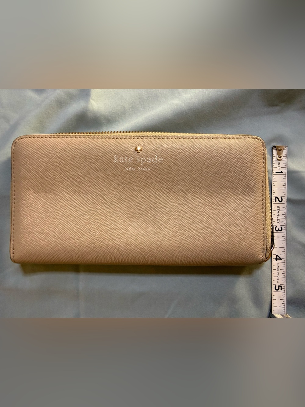 kate spade beige zip-around wallet with gold logo